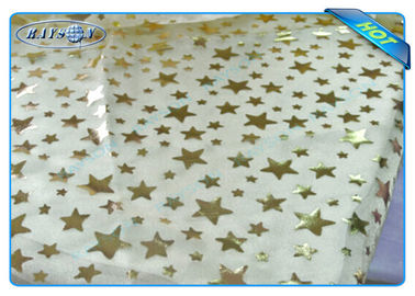 Diposableの金クリスマスの装飾のための星によって印刷される非編まれたテーブルクロスのロール/部分