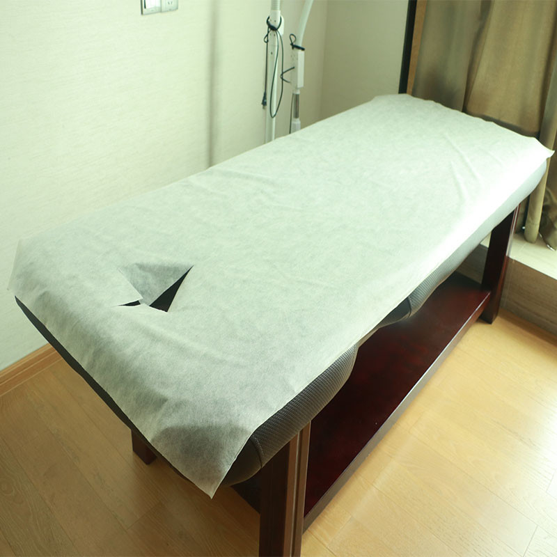 Dispoable Spunbondの顔の穴のピンクの青い色の非編まれたマッサージのテーブルのシーツ